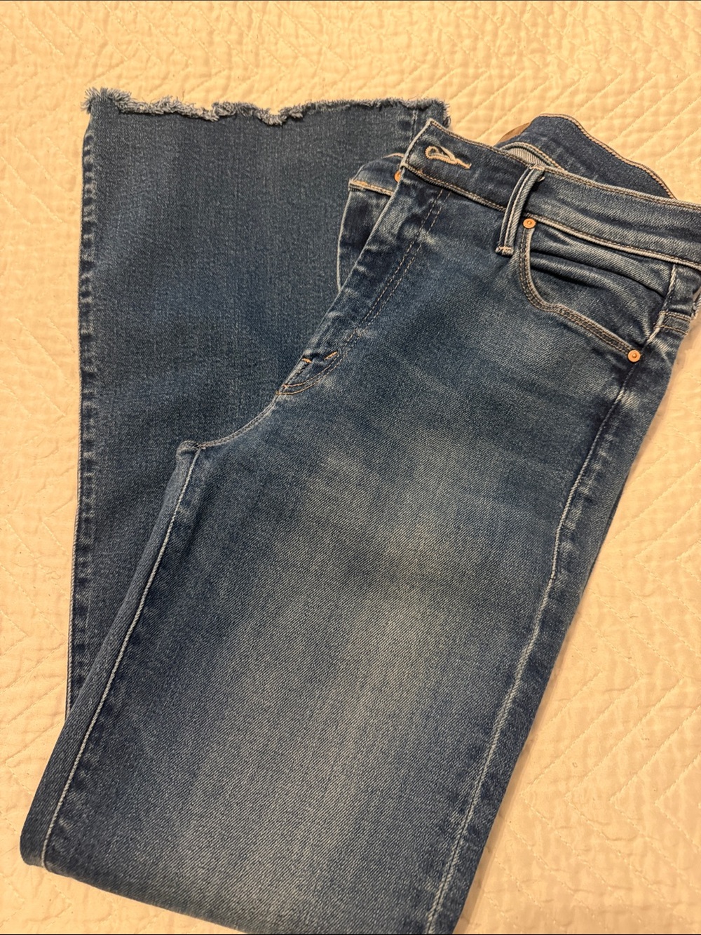 MOTHER Bootcut Weekender Fray Denim Jeans in Medium Blue with Frayed Hem